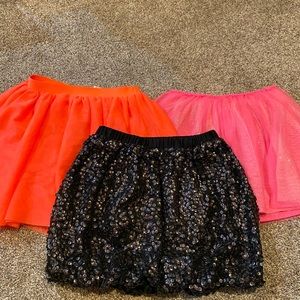 Three skirts and one short. Sequins for dancin